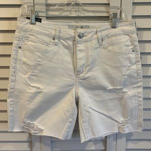 Joe’s white Bermuda shorts